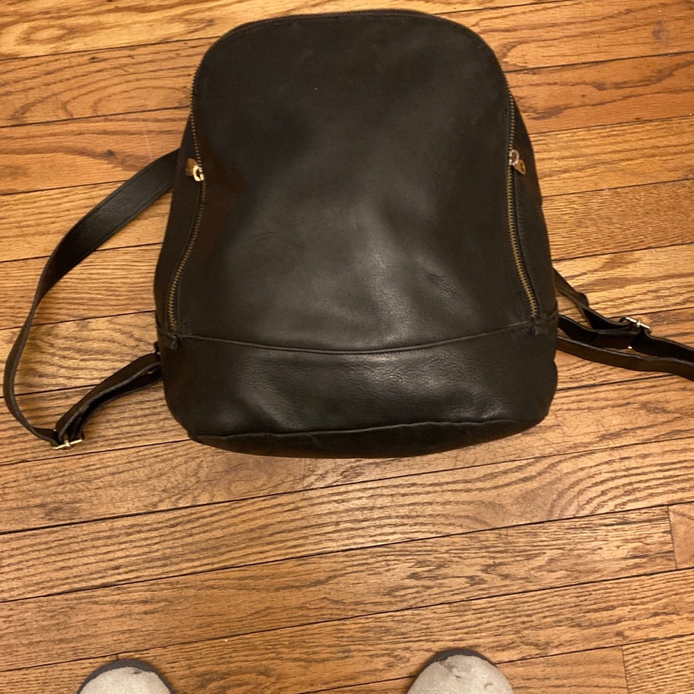 Furla black leather streamlined backpack